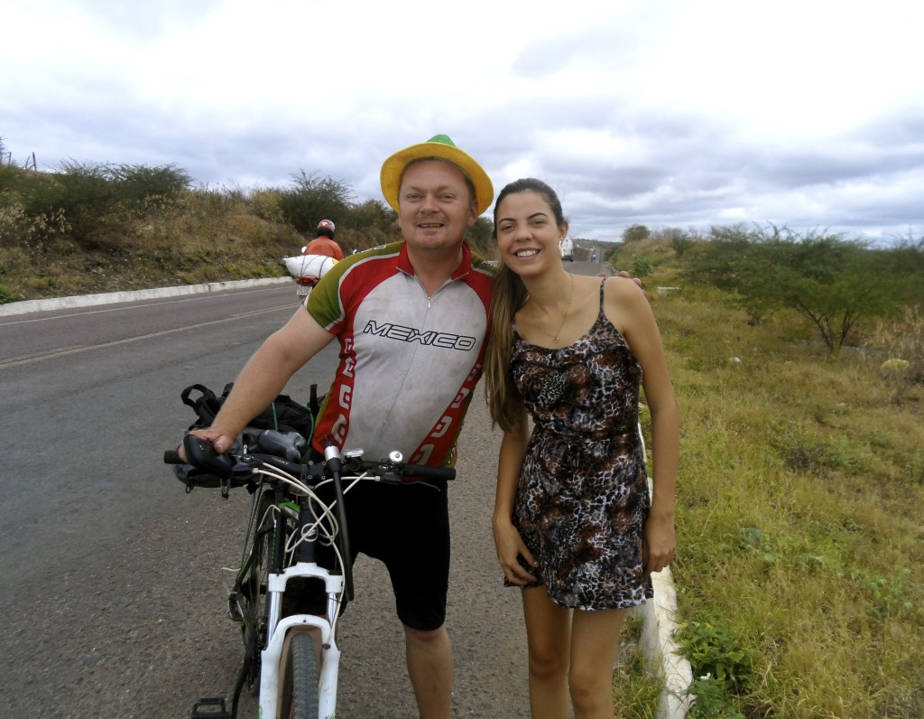 Posing for photos with a local girl in Pernambuco.