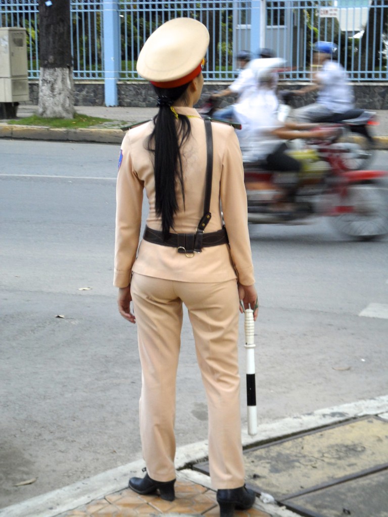 Beautiful vietnamese traffic police girl.
