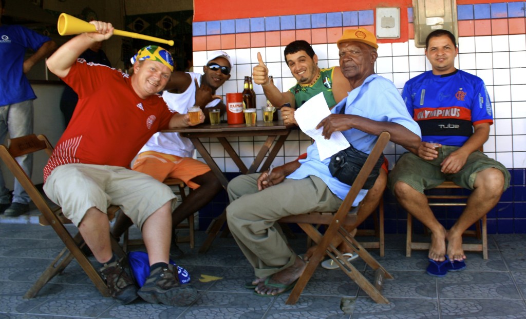 With fellow football fans in rural Brazil