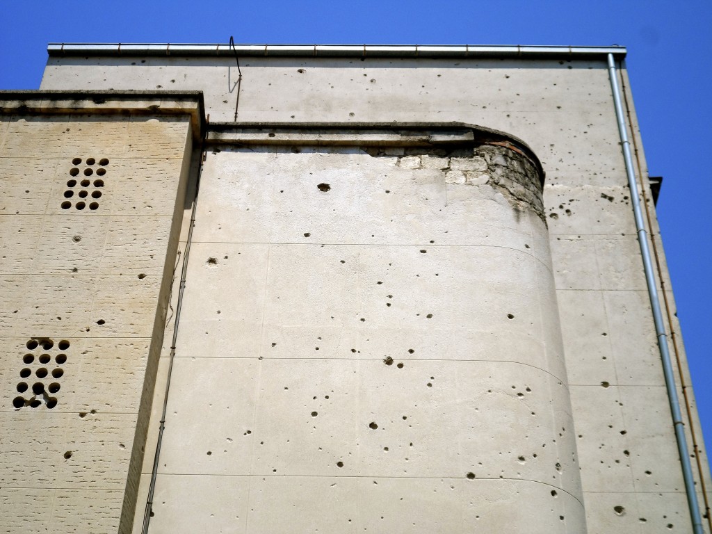 Bullet holes in a building in East Mostar.