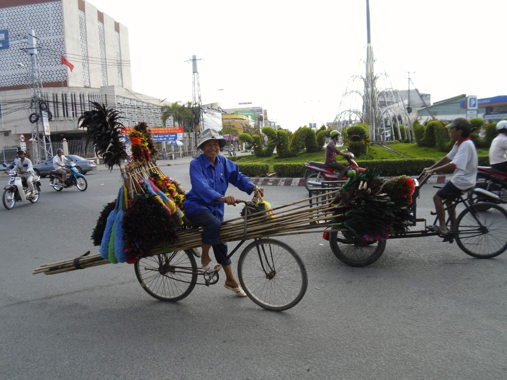 The cycling broom salesman.