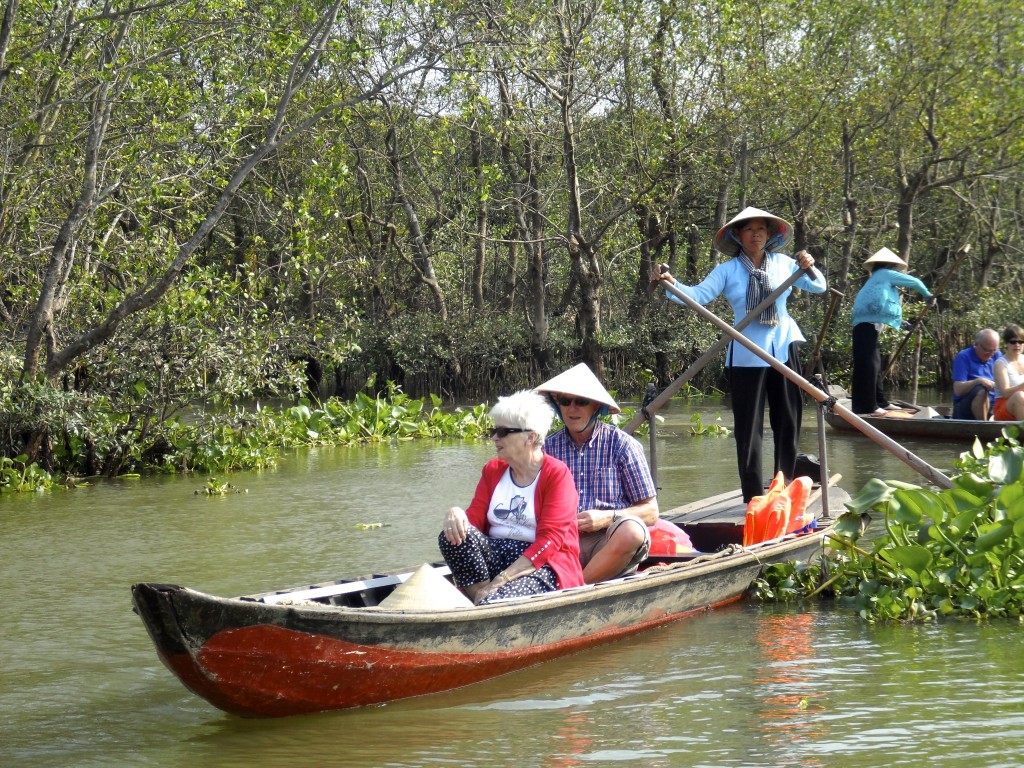 Happy tourists in the Mekong Delta.