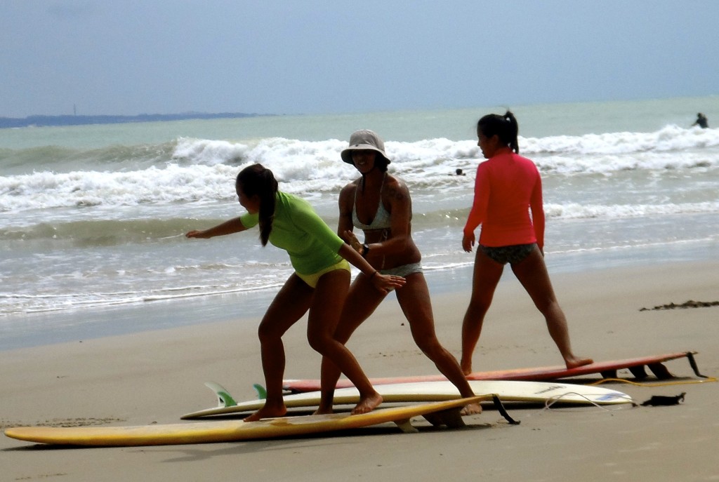 Surfer girls on Praia da Pipa.