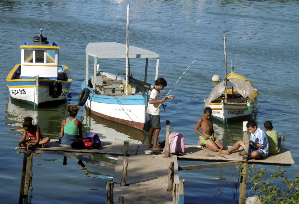 Brazilian children fishing.