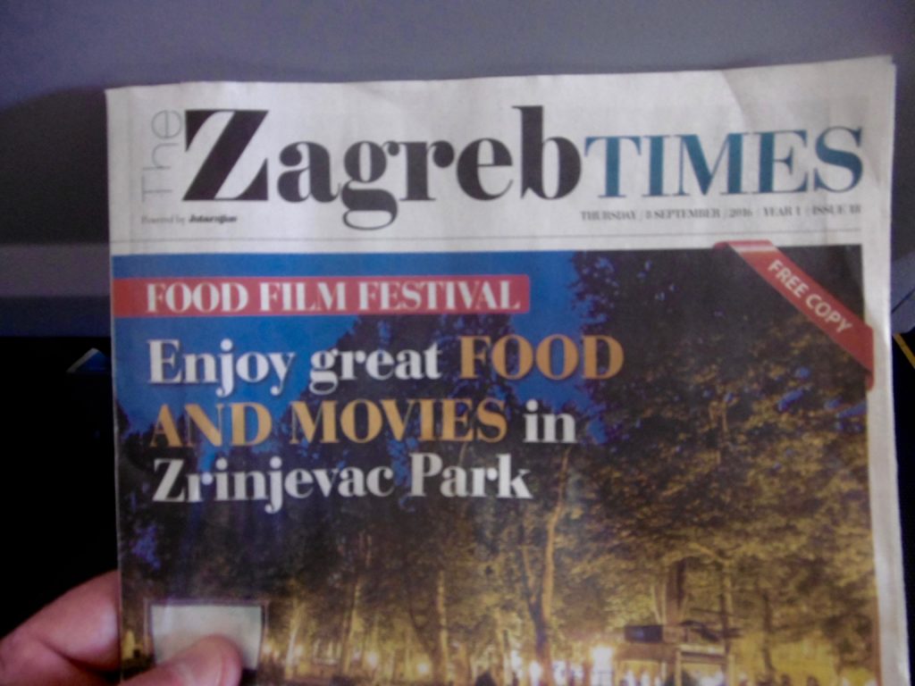Reading Zagreb Times on the flight.
