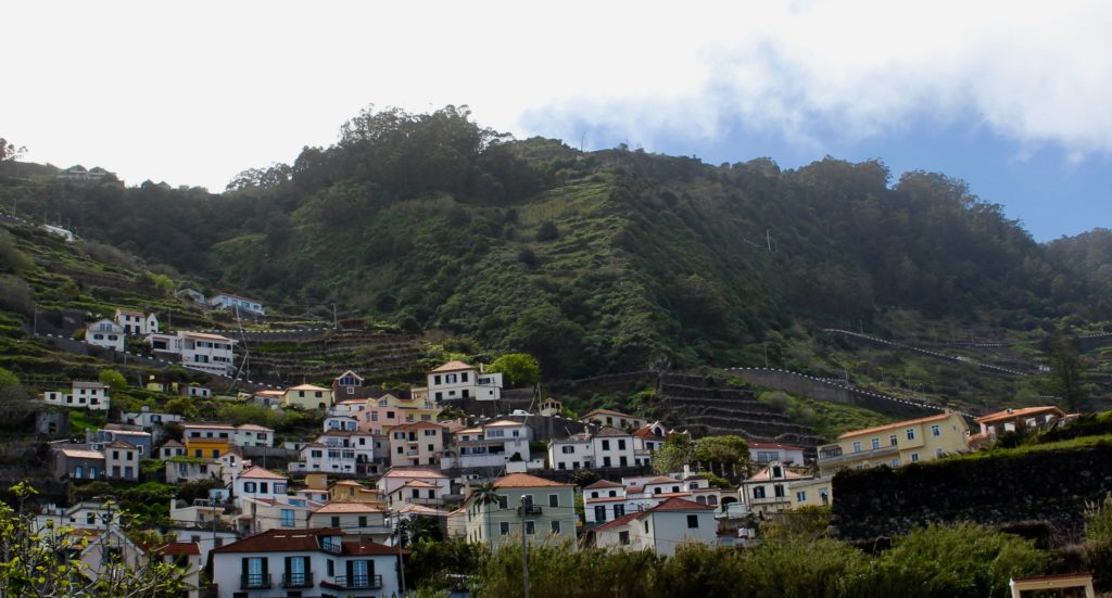 Porto Moniz clings to the steep mountain slopes.