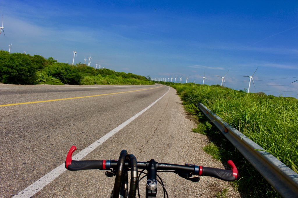 Cycling past windfarms at La Ventosa.