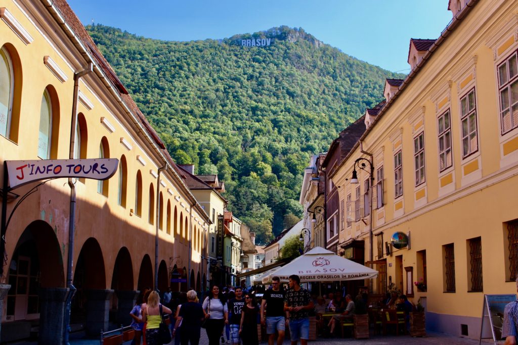 Brasov is a beautiful town with a Hollywood sign on top.