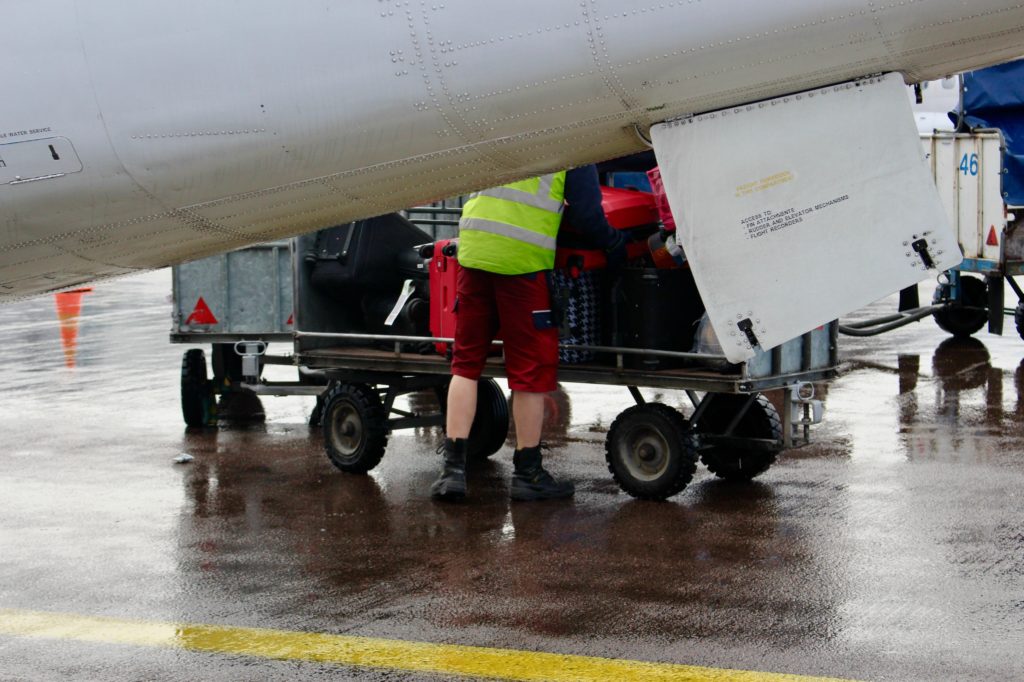 Helsinki baggage handlers wearing shorts in December.