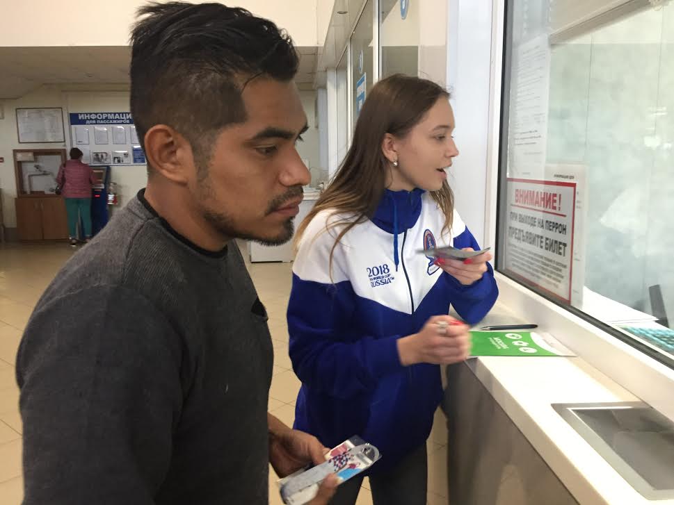 Young Volunteer in Saransk, helping a Peruvian fan to buy a bus ticket.