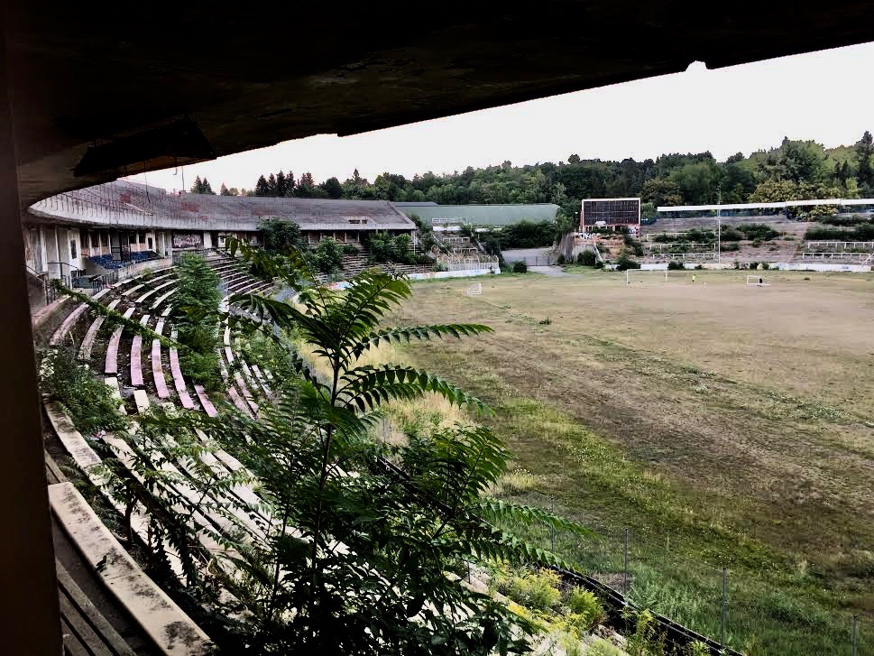 The stadium is once again overgrown and empty.