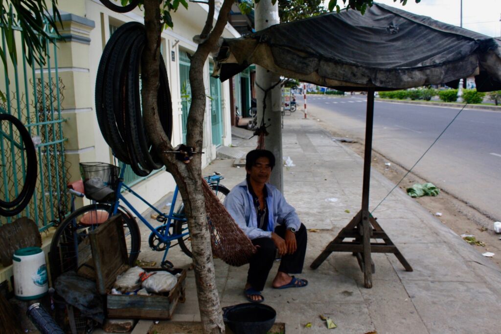 Bicycle repairman Vietnam.